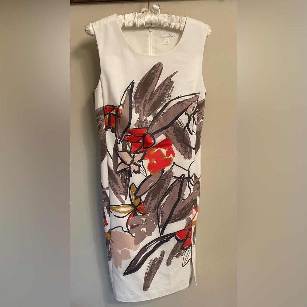 Women’s sleeveless sheath dress size 6. White with orange and brown design